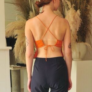 The Great Eros crepe silk orange tie back camisole